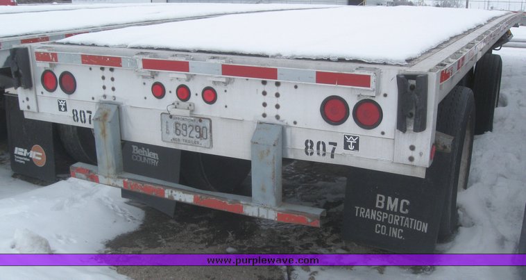 image for item 7814 Wilson 48' spread axle flat bed trailer