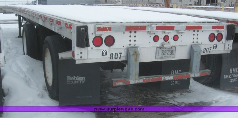 image for item 7814 Wilson 48' spread axle flat bed trailer