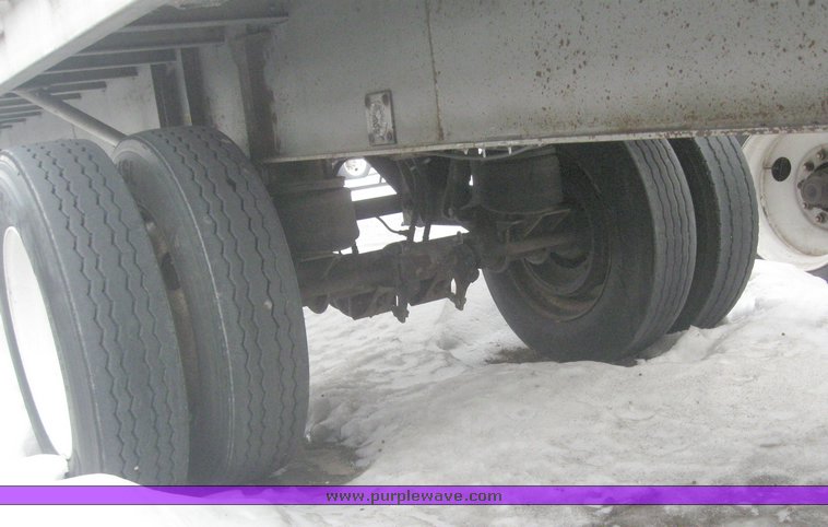 image for item 7814 Wilson 48' spread axle flat bed trailer