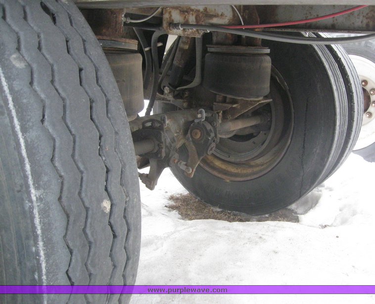 image for item 7814 Wilson 48' spread axle flat bed trailer