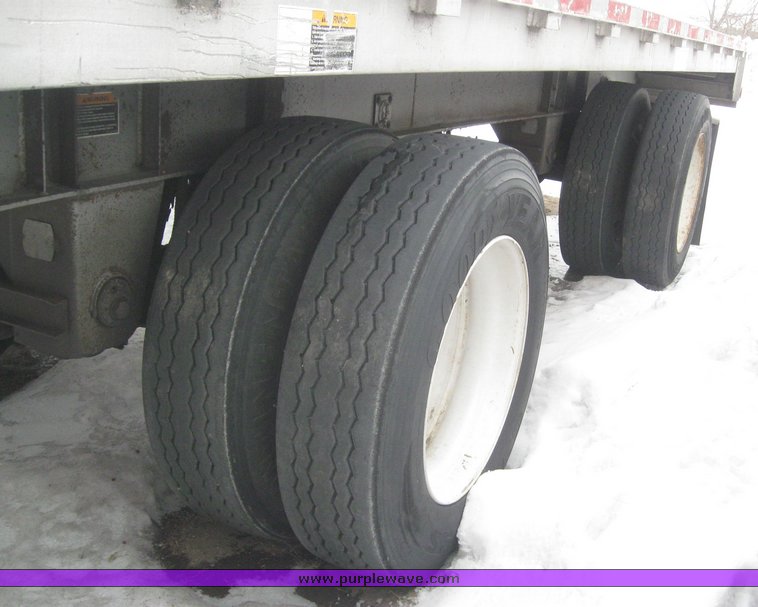 image for item 7814 Wilson 48' spread axle flat bed trailer