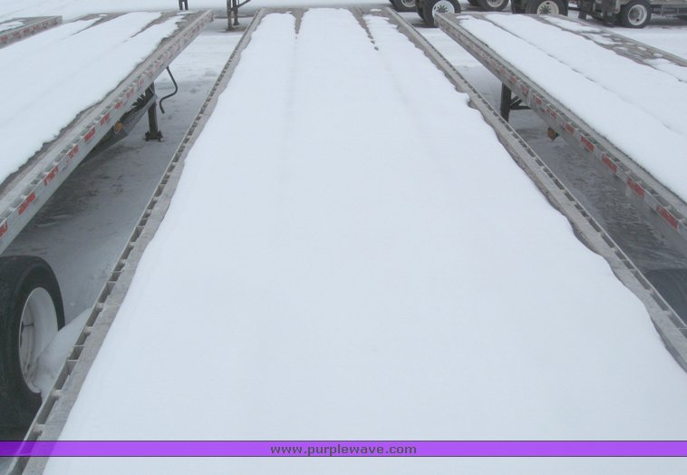 image for item 7814 Wilson 48' spread axle flat bed trailer