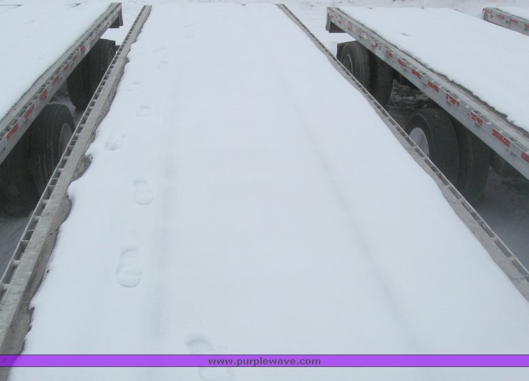 image for item 7814 Wilson 48' spread axle flat bed trailer