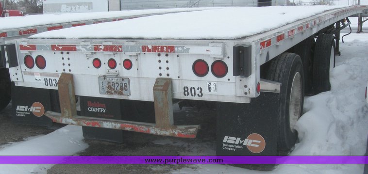 image for item 7815 1995 Wilson 48' spread axle flat bed trailer