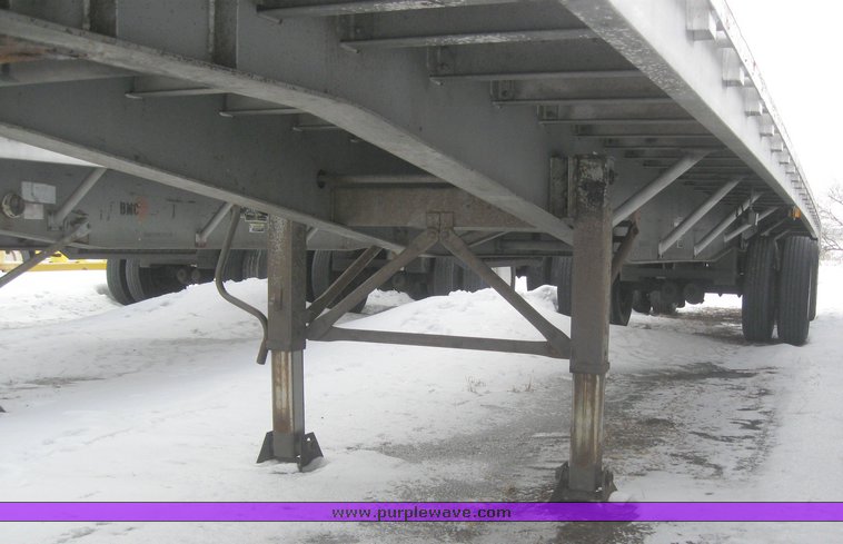 image for item 7815 1995 Wilson 48' spread axle flat bed trailer