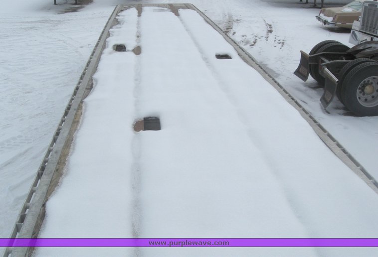 image for item 7817 1995 Wilson 48' spread axle flat bed trailer