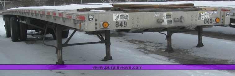 image for item 7818 1997 Wilson 48' spread axle flat bed trailer