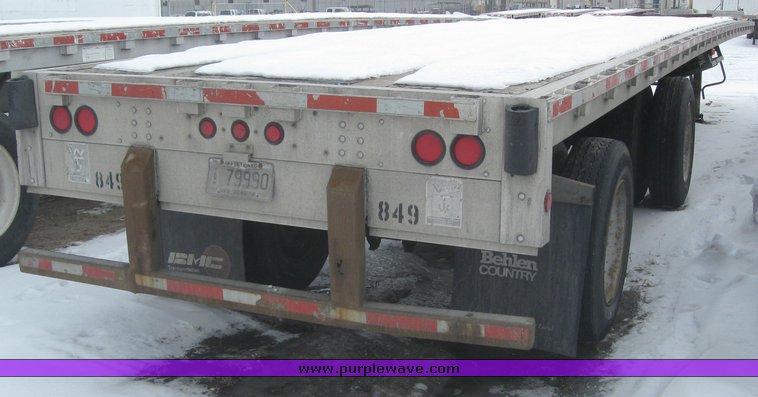 image for item 7818 1997 Wilson 48' spread axle flat bed trailer