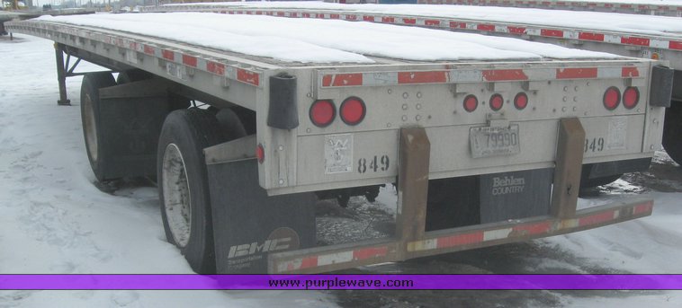 image for item 7818 1997 Wilson 48' spread axle flat bed trailer