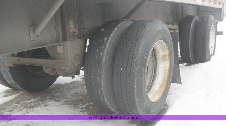 image for item 7818 1997 Wilson 48' spread axle flat bed trailer