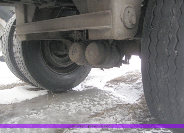 image for item 7818 1997 Wilson 48' spread axle flat bed trailer