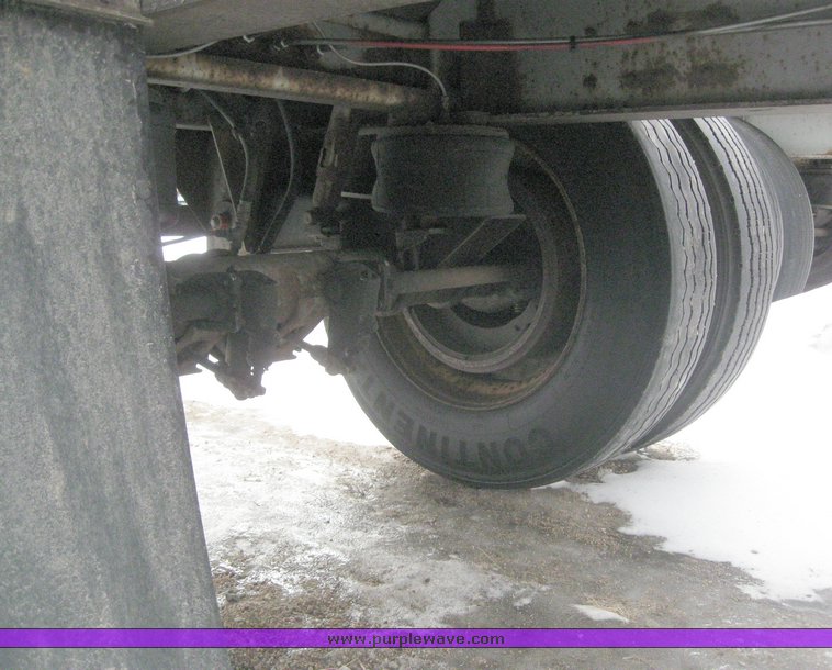 image for item 7818 1997 Wilson 48' spread axle flat bed trailer