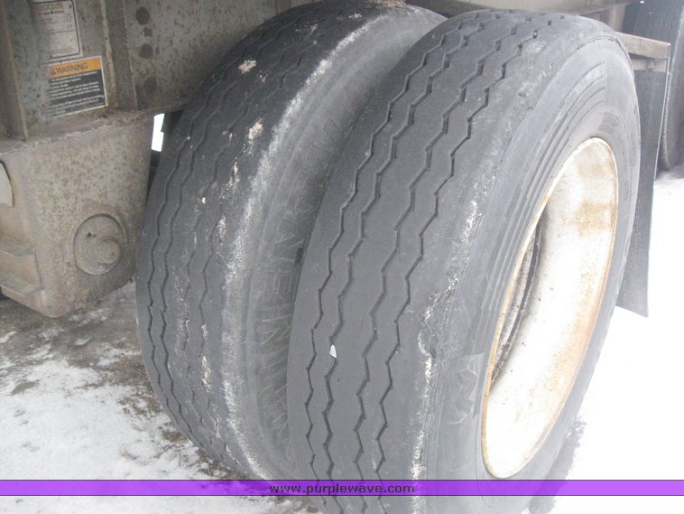 image for item 7818 1997 Wilson 48' spread axle flat bed trailer