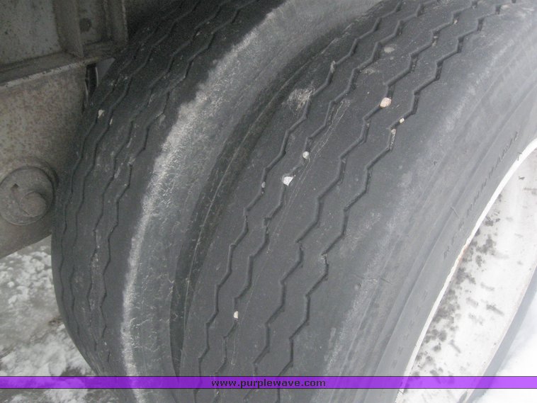 image for item 7818 1997 Wilson 48' spread axle flat bed trailer