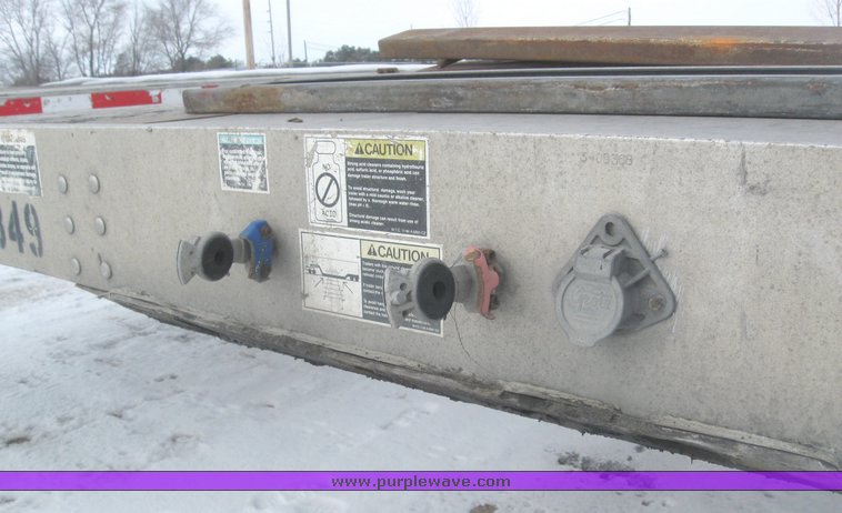 image for item 7818 1997 Wilson 48' spread axle flat bed trailer