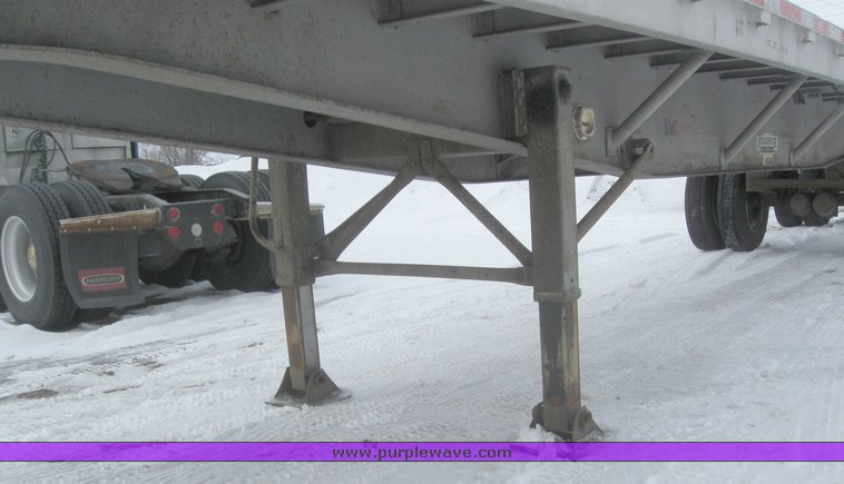 image for item 7818 1997 Wilson 48' spread axle flat bed trailer