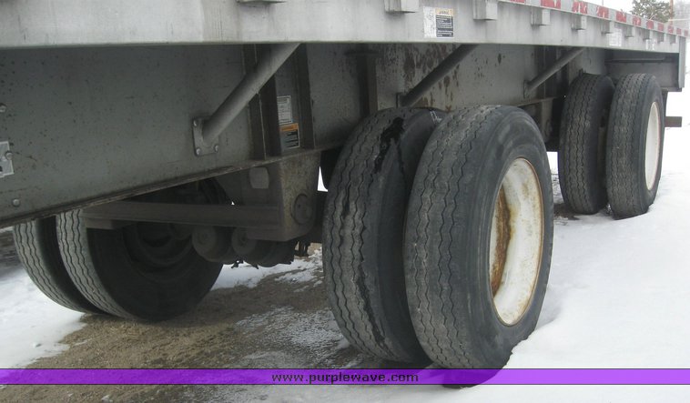 image for item 7819 1997 Wilson 48' spread axle flat bed trailer