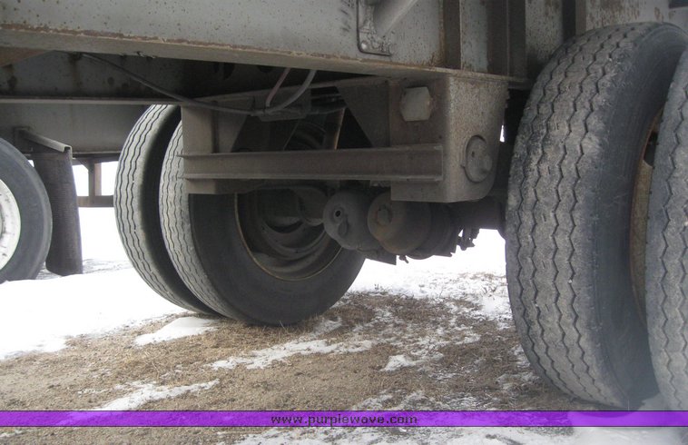 image for item 7819 1997 Wilson 48' spread axle flat bed trailer