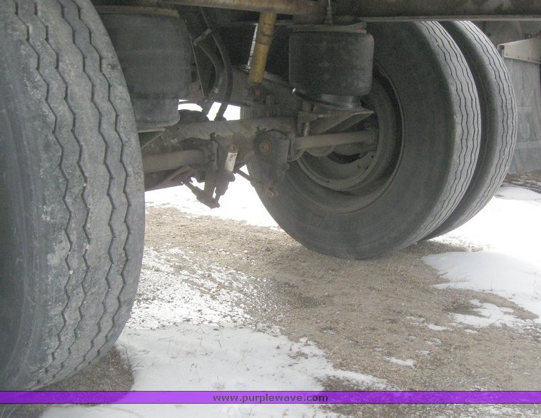 image for item 7819 1997 Wilson 48' spread axle flat bed trailer