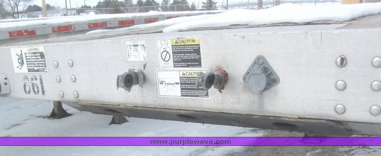 image for item 7819 1997 Wilson 48' spread axle flat bed trailer