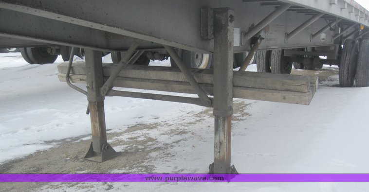image for item 7819 1997 Wilson 48' spread axle flat bed trailer