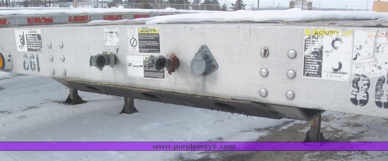 image for item 7819 1997 Wilson 48' spread axle flat bed trailer