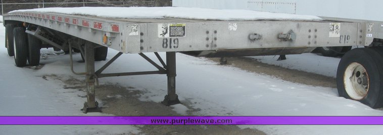 image for item 7820 1995 Wilson 48' spread axle flat bed trailer