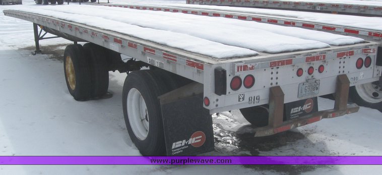 image for item 7820 1995 Wilson 48' spread axle flat bed trailer