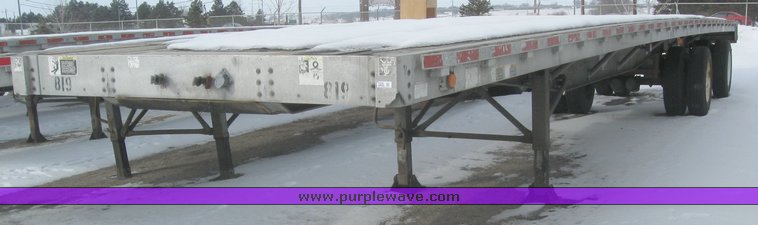 image for item 7820 1995 Wilson 48' spread axle flat bed trailer