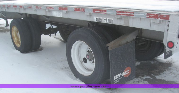image for item 7820 1995 Wilson 48' spread axle flat bed trailer