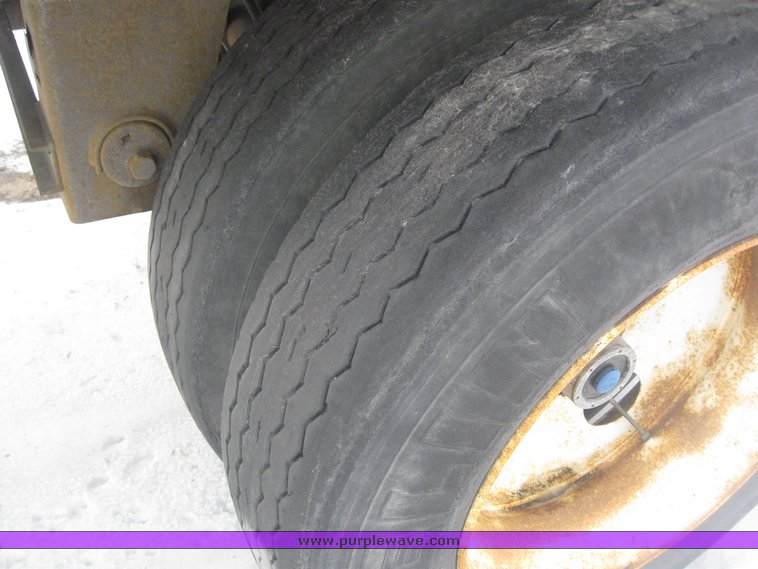 image for item 7820 1995 Wilson 48' spread axle flat bed trailer