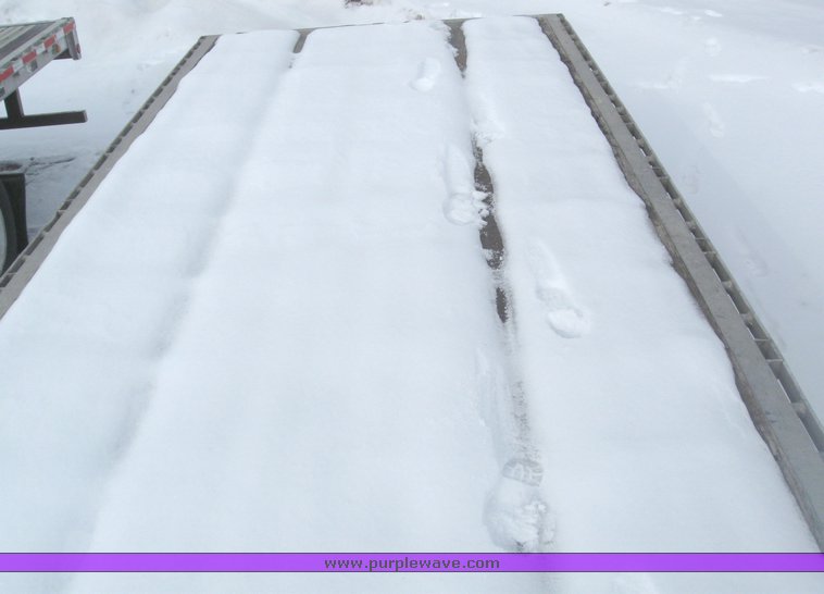 image for item 7820 1995 Wilson 48' spread axle flat bed trailer