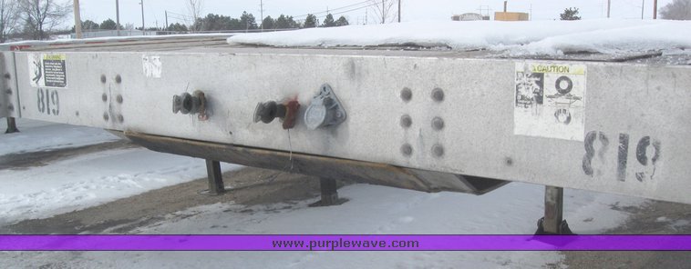image for item 7820 1995 Wilson 48' spread axle flat bed trailer