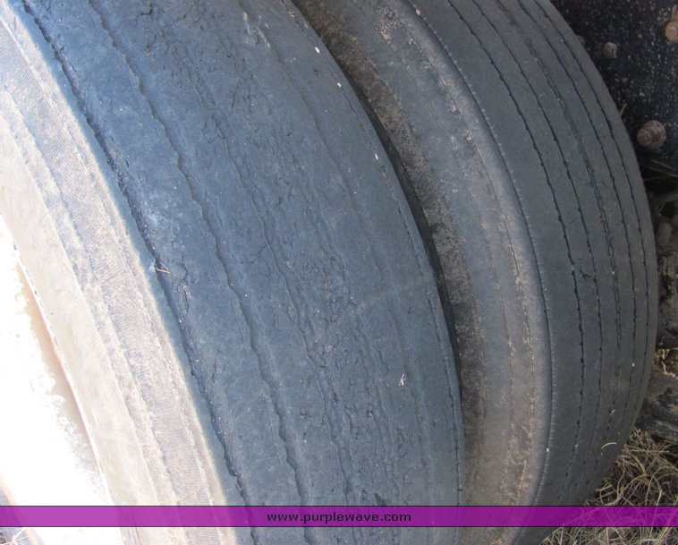 image for item 3003 1995 Freightliner Conventional FLD112 semi truck