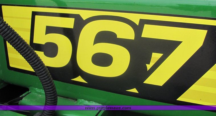 image for item 3048 2001 John Deere 567 round baler