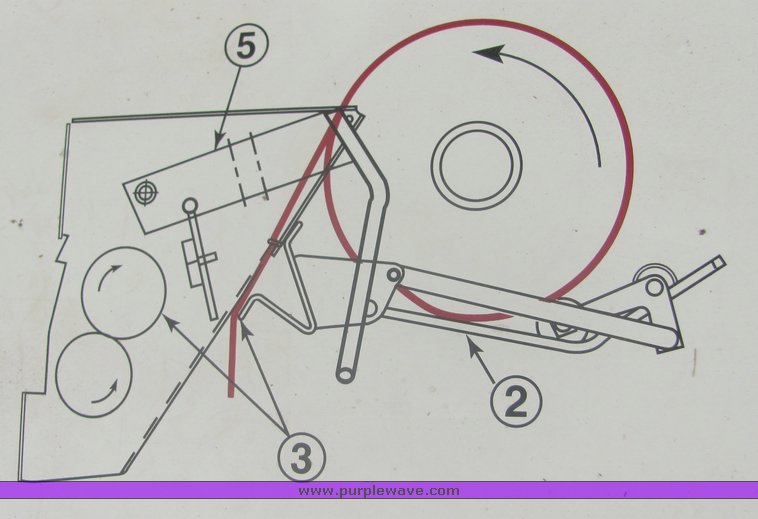 image for item 3048 2001 John Deere 567 round baler