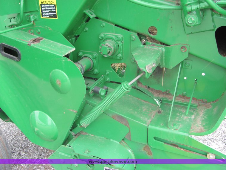 image for item 3048 2001 John Deere 567 round baler