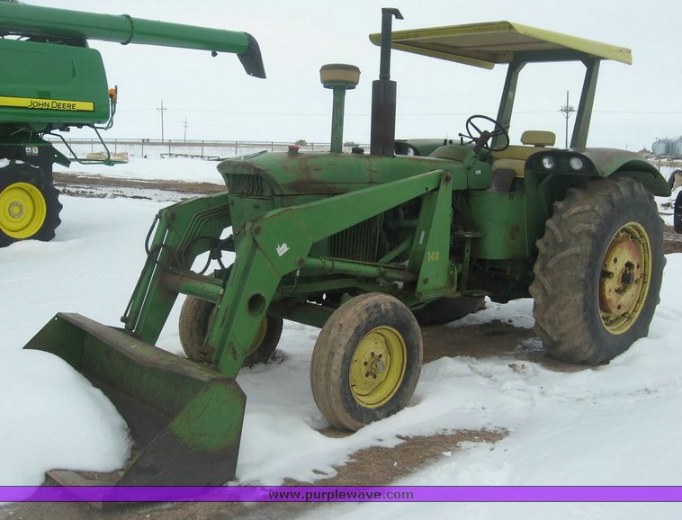 John Deere 4020 Wheatland tractor with John Deere 148 loader in Dumas