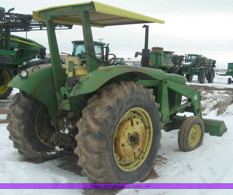 image for item 3895 John Deere 4020 Wheatland tractor with John Deere 148 loader