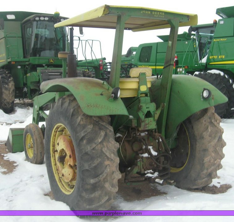 image for item 3895 John Deere 4020 Wheatland tractor with John Deere 148 loader