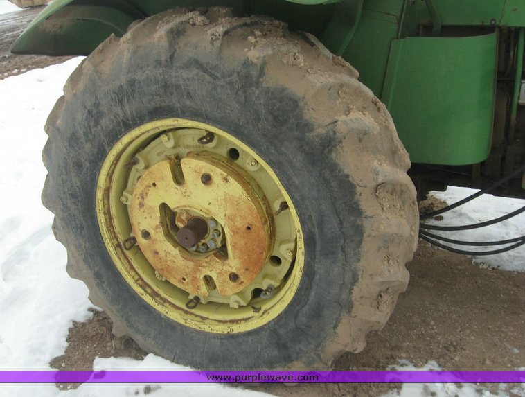 image for item 3895 John Deere 4020 Wheatland tractor with John Deere 148 loader