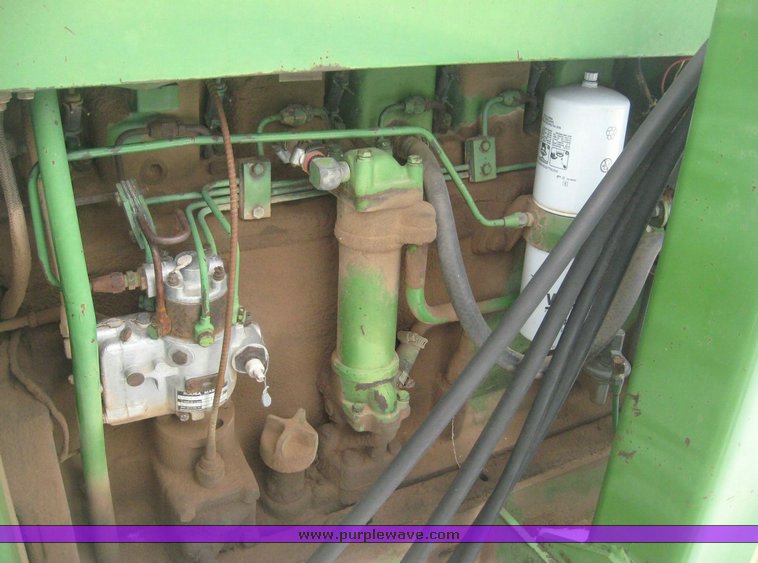 image for item 3895 John Deere 4020 Wheatland tractor with John Deere 148 loader