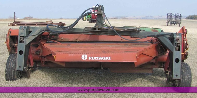 image for item 6661 Hesston 1160 14' hydro swing swather