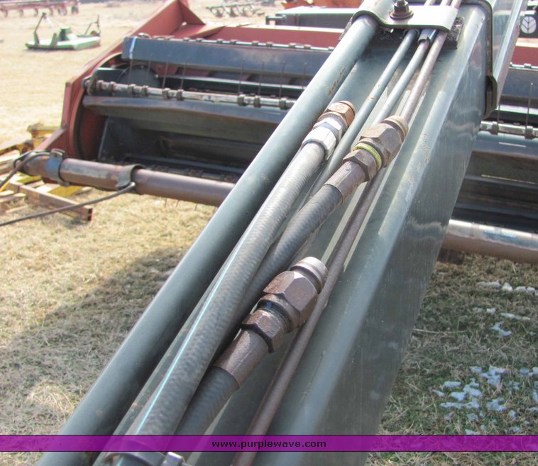 image for item 6661 Hesston 1160 14' hydro swing swather