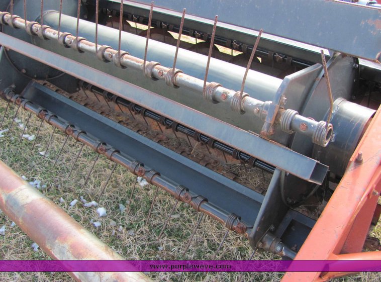 image for item 6661 Hesston 1160 14' hydro swing swather