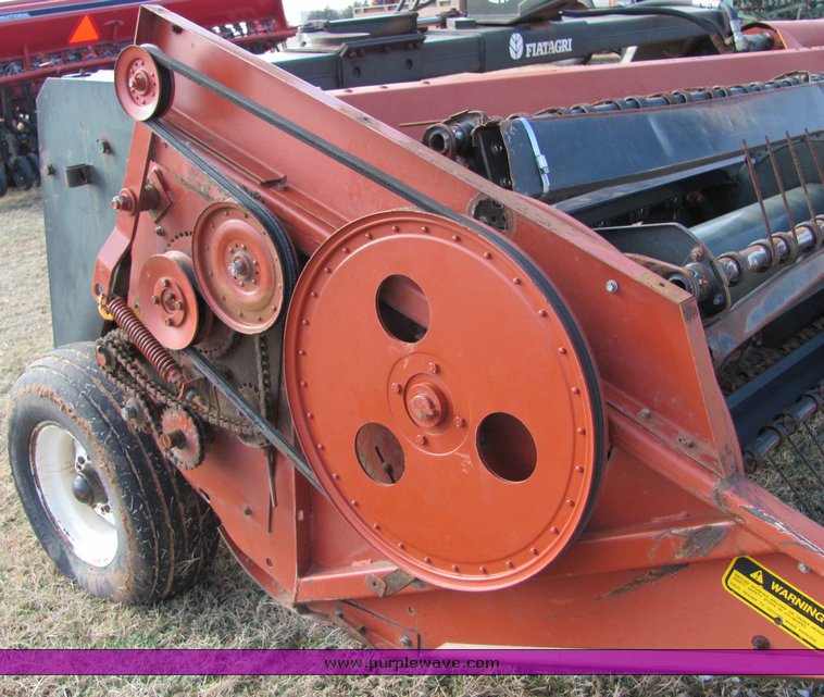 image for item 6661 Hesston 1160 14' hydro swing swather