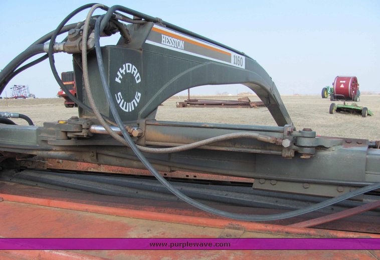 image for item 6661 Hesston 1160 14' hydro swing swather