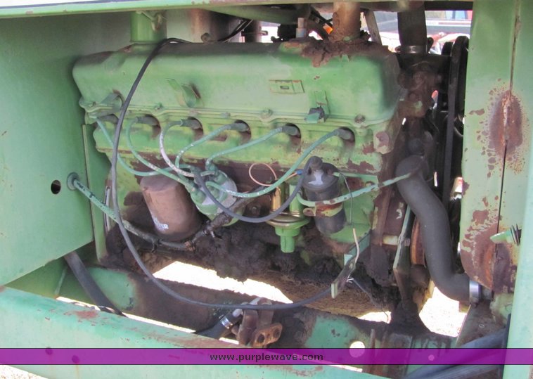 image for item 6712 John Deere 2250 swather