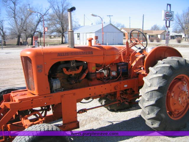 image for item 1100 1955 Allis Chalmers WD45 broom tractor