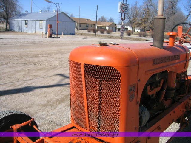 image for item 1100 1955 Allis Chalmers WD45 broom tractor